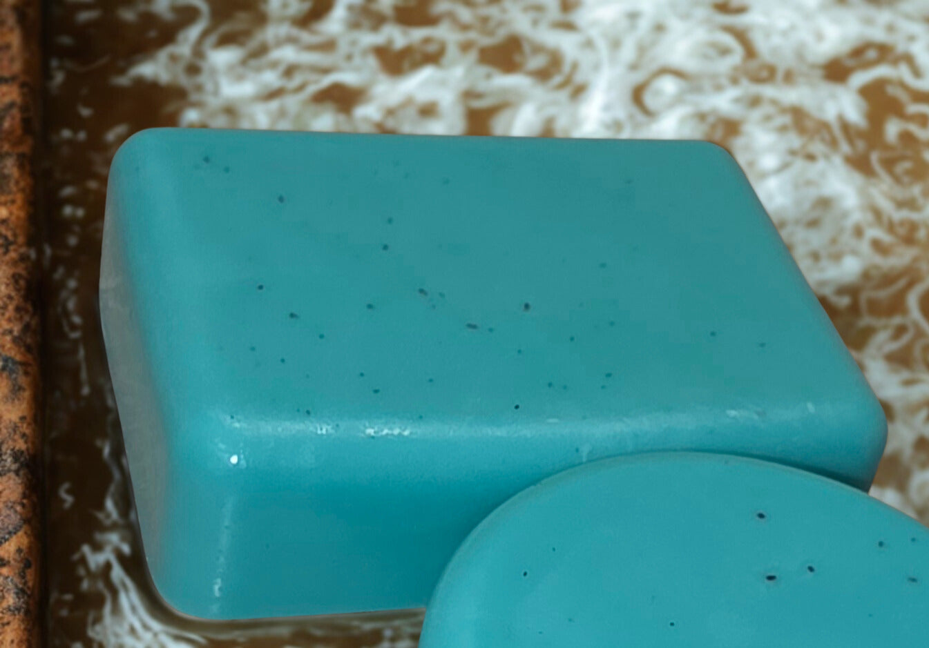 Handmade peppermint goat milk soap – turquoise rectangular artisan bar crafted in Michigan.