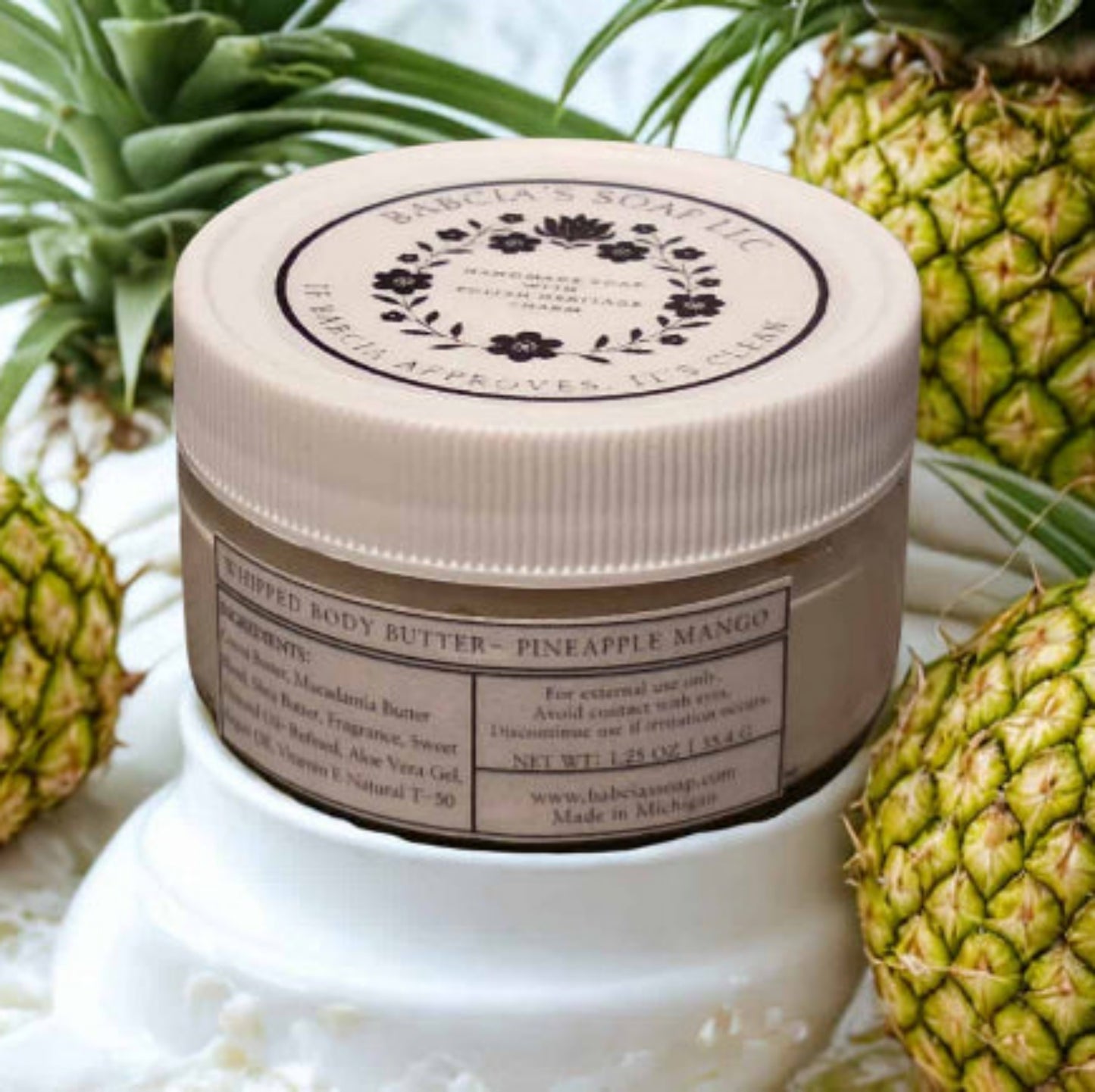 Jar of whipped body butter with pineapple mango scent