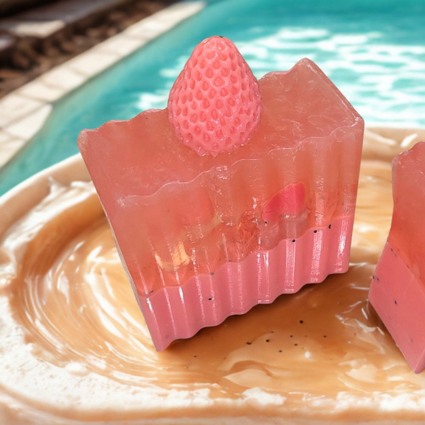 Handmade strawberry goat milk soap – pink bars with strawberry toppers, artisan Michigan gift soap.