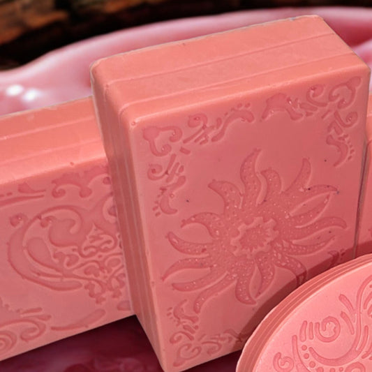 Pink soap bars with embossed designs