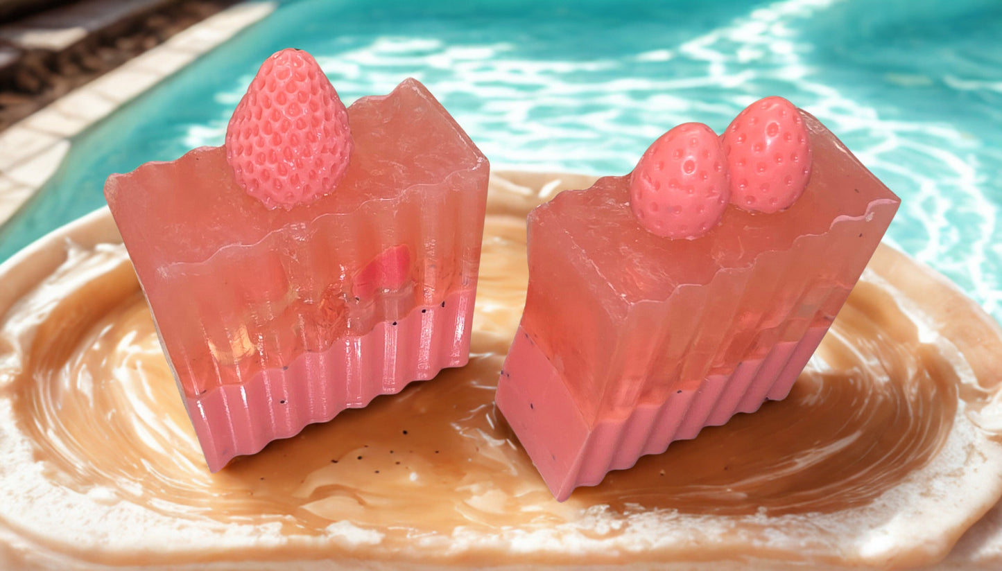Handmade strawberry goat milk soap – pink bars with strawberry toppers, artisan Michigan gift soap.