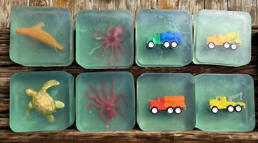 Handmade vanilla melt and pour soap – square bars with embedded toys, Michigan artisan gift soap.